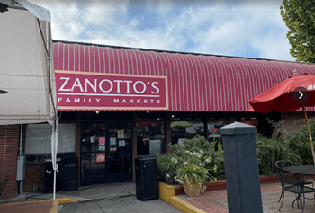 a building with a sign family markets